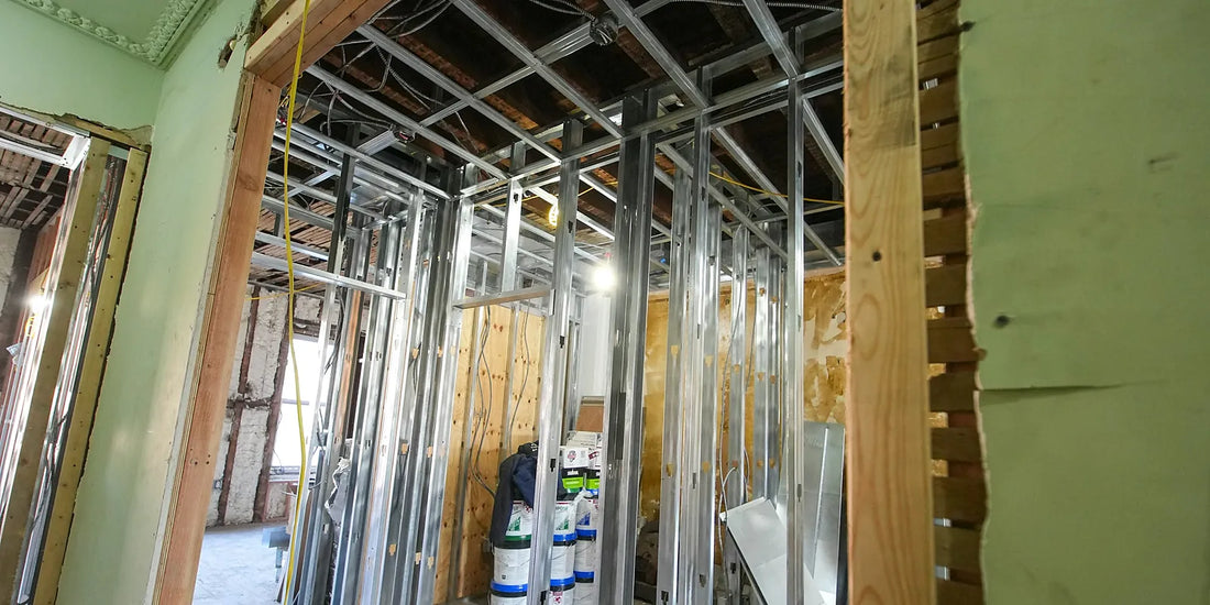 Steel stud partition framing in an interior fitout before lining
