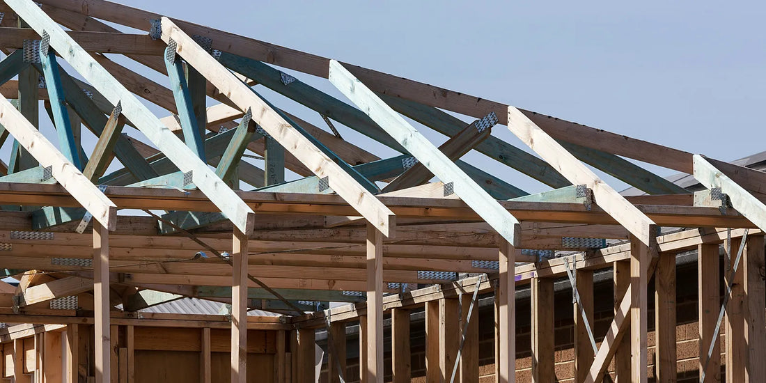 Timber roof trusses and stud wall framing on an Australian house under construction