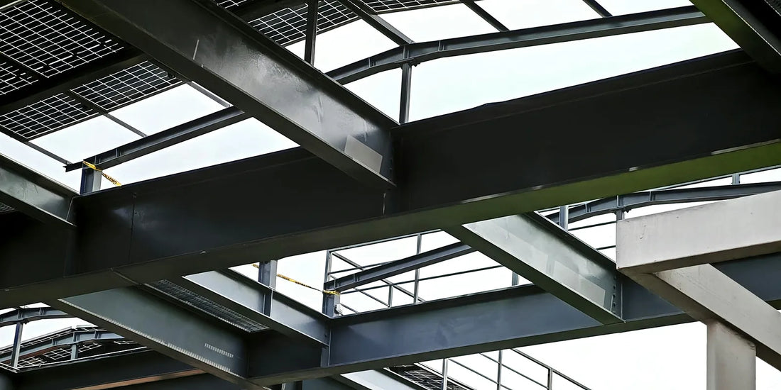 Steel roof structure seen from below, showing beams and purlins