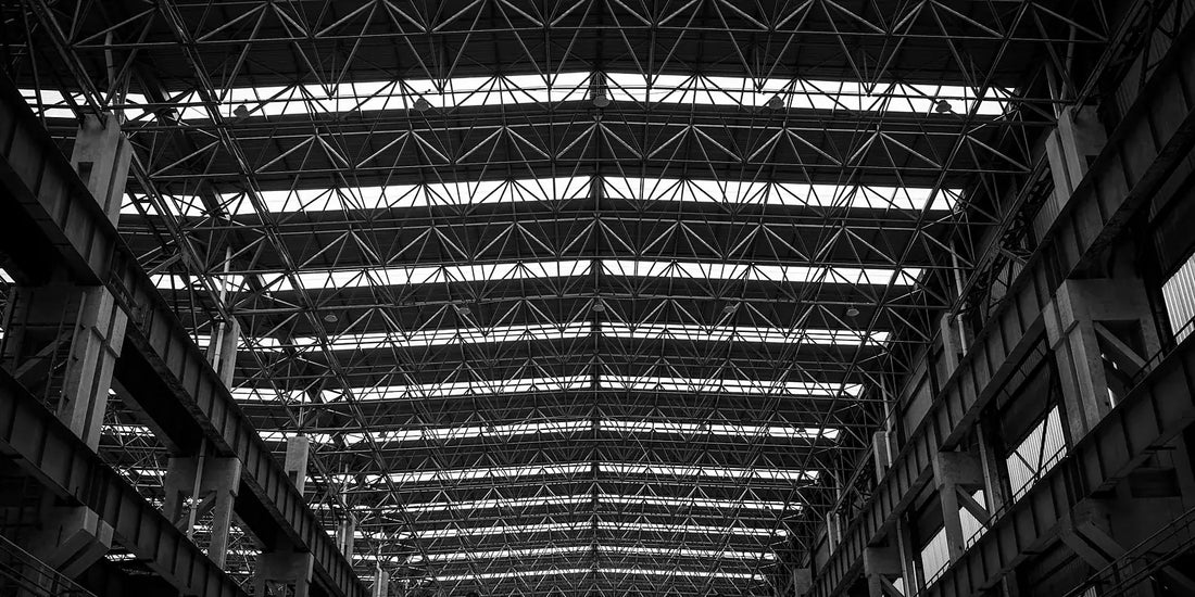 Steel truss and purlin roof structure inside a large industrial building