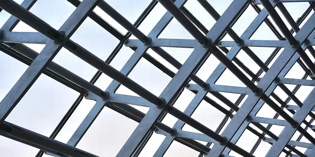 Steel roof frame on a construction site seen from below