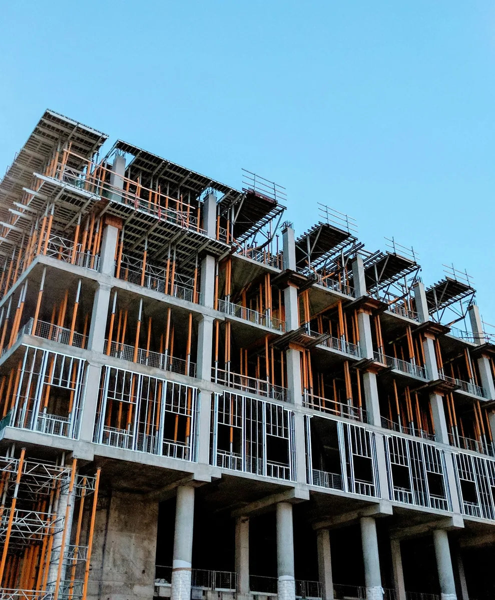Commercial building under construction with insulation being installed