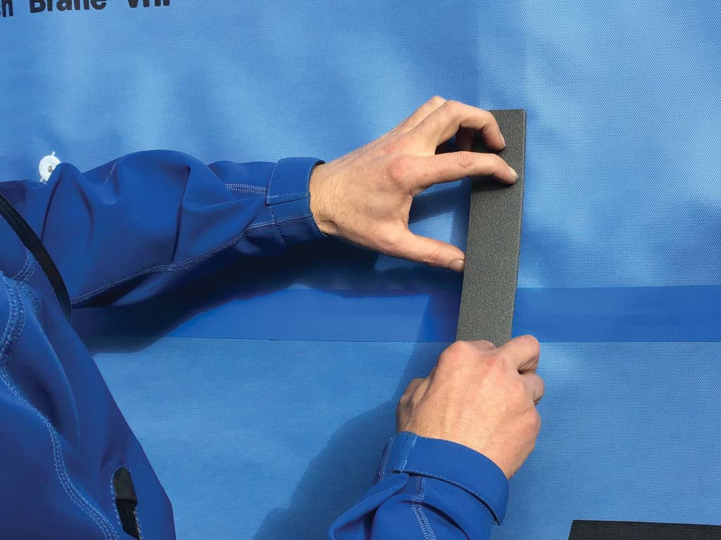 Ametalin R0.25 ThermalBreak Strip being applied to a steel frame