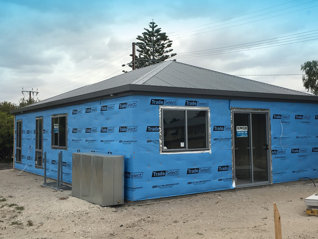 House frame wrapped in Trade Select Wall Wrap before cladding