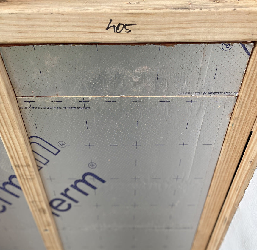 Kooltherm K12 residential batt in a stud bay, with an offcut filling the gap under the noggin