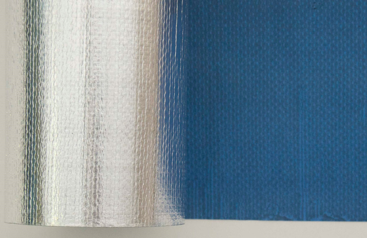 Rhino Multi Purpose RP-51-WR roll, reflective foil face on the roll and blue mesh face on the unrolled sheet